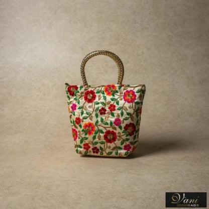 Gold handle flower bloom leather handbag