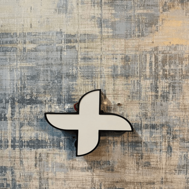 Windmill shaped wall light