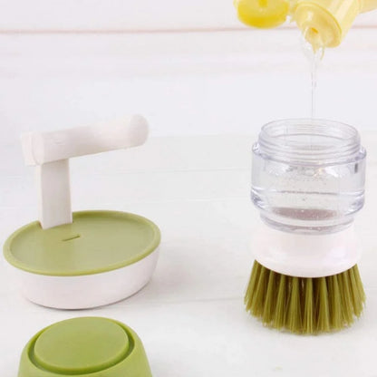 Dish washing brush with liquid dispenser storage stand
