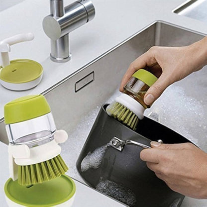 Dish washing brush with liquid dispenser storage stand