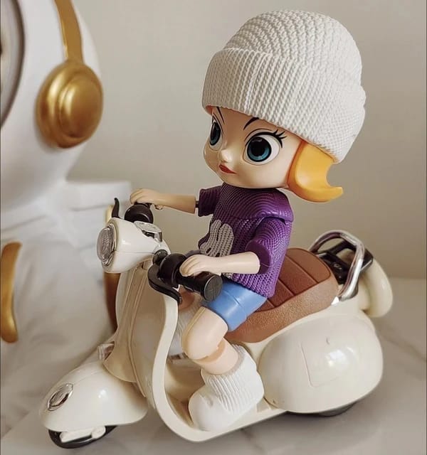 Vespa scooter doll with light sounds.