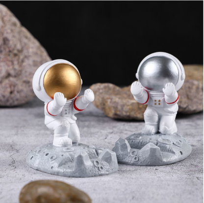 Astronaut plastic spacesuit figurine  phone holder