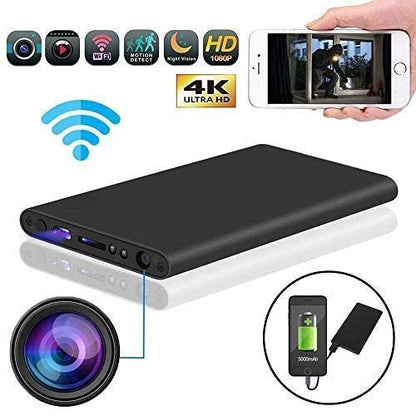 Black portable power bank with smartphone displaying video, camera lens, and charging details.