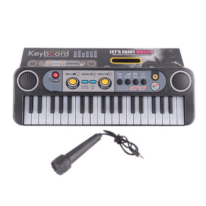 Mini electric piano keyboard with microphone