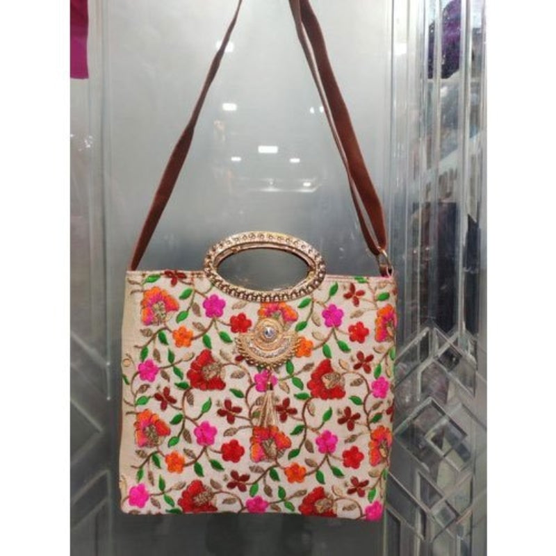 Gold handle flower bloom leather handbag