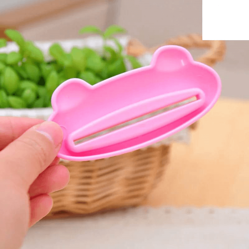 Cartoon modeling auto toothpaste squeezer